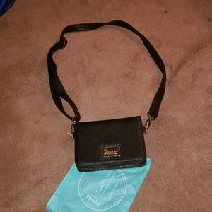 Adjustable cross body bag
